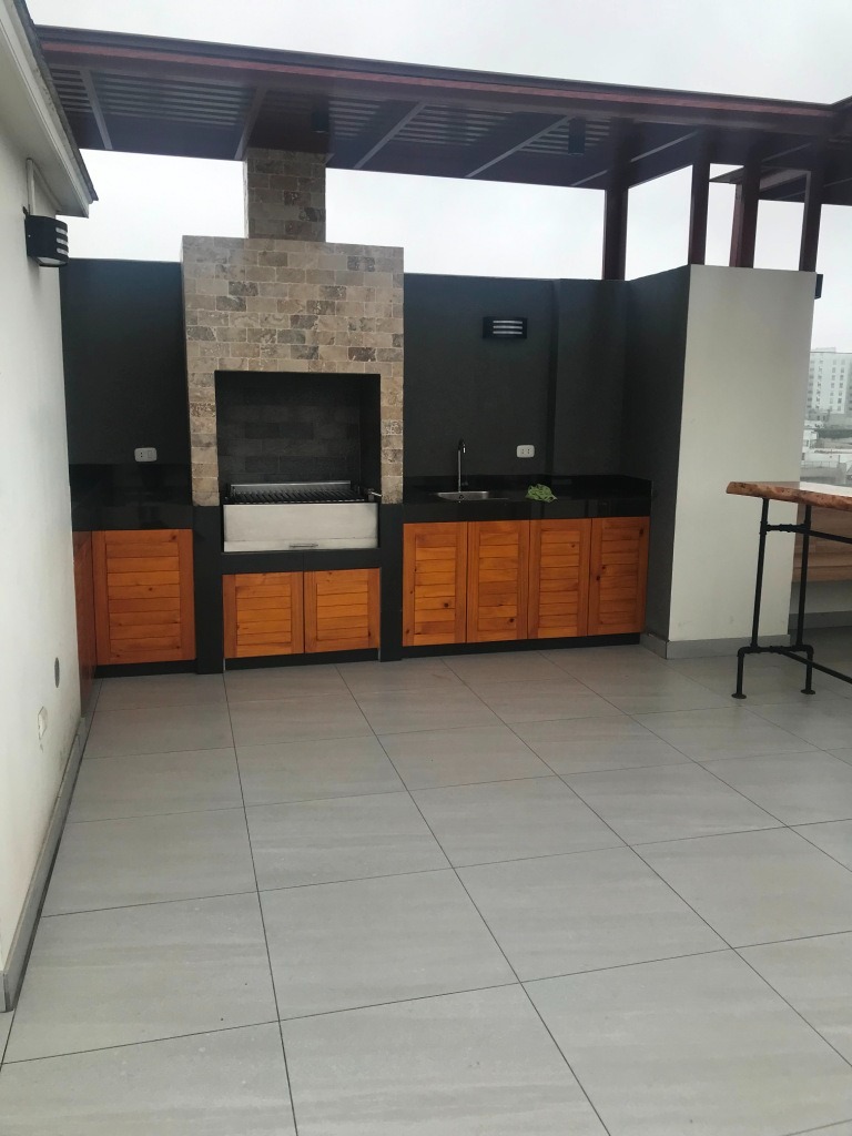 Área Común. Terraza y Zona de Parrilla